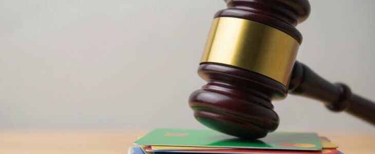 Gavel over credit cards